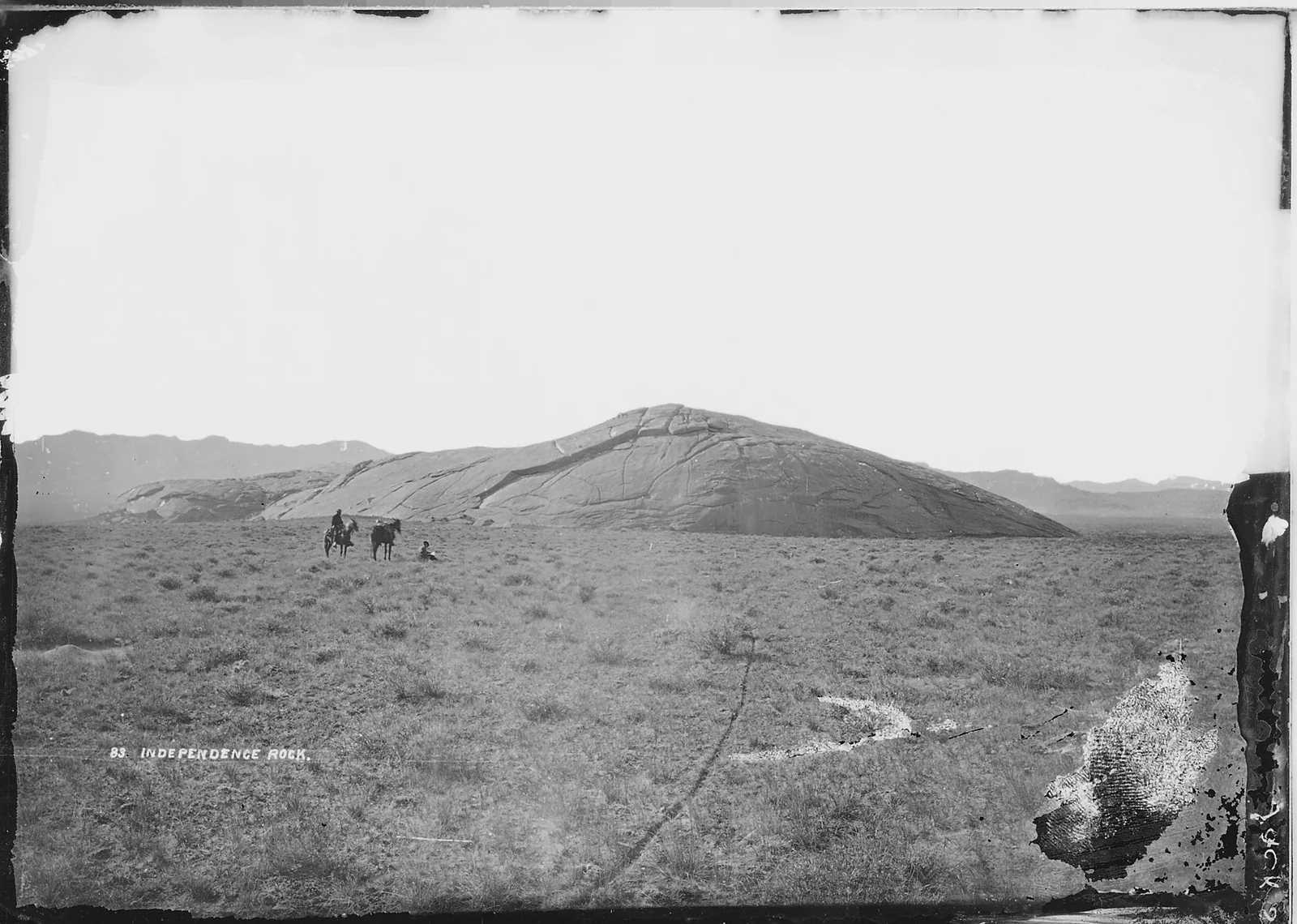 William Henry Jackson's 1870 photograph of Independence Rock, a granite dome rising from the Sweetwater plain